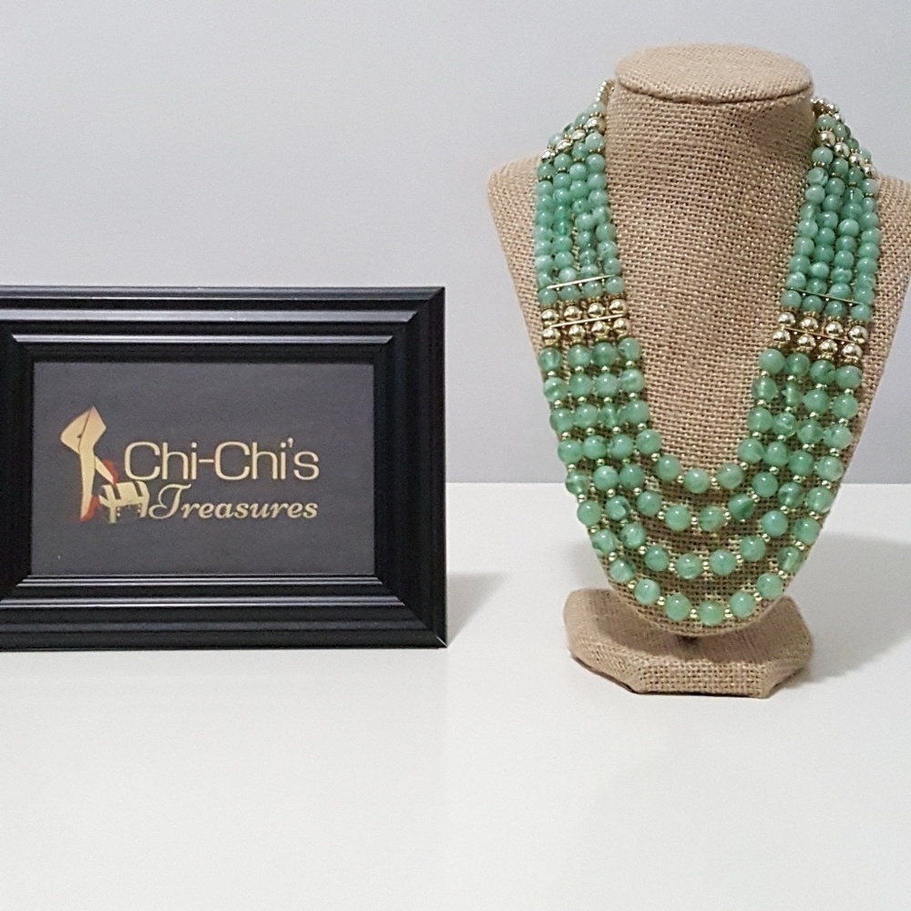 FOUR STRAND BEADED NECKLACE